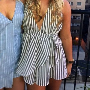 Black and white tie romper.